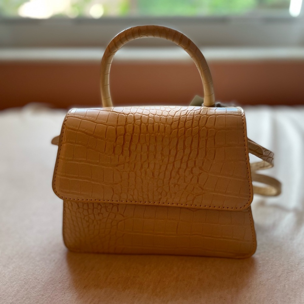 Mini cross body bag. Tiny, fits iPhone 12 Pro.
